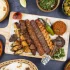 mix-grills-tikka-boti-seekh-kabab-chicken-beef-lamb-mutton-bbq-platter-assorted-served-dish-table-top-view-arabian-324565865